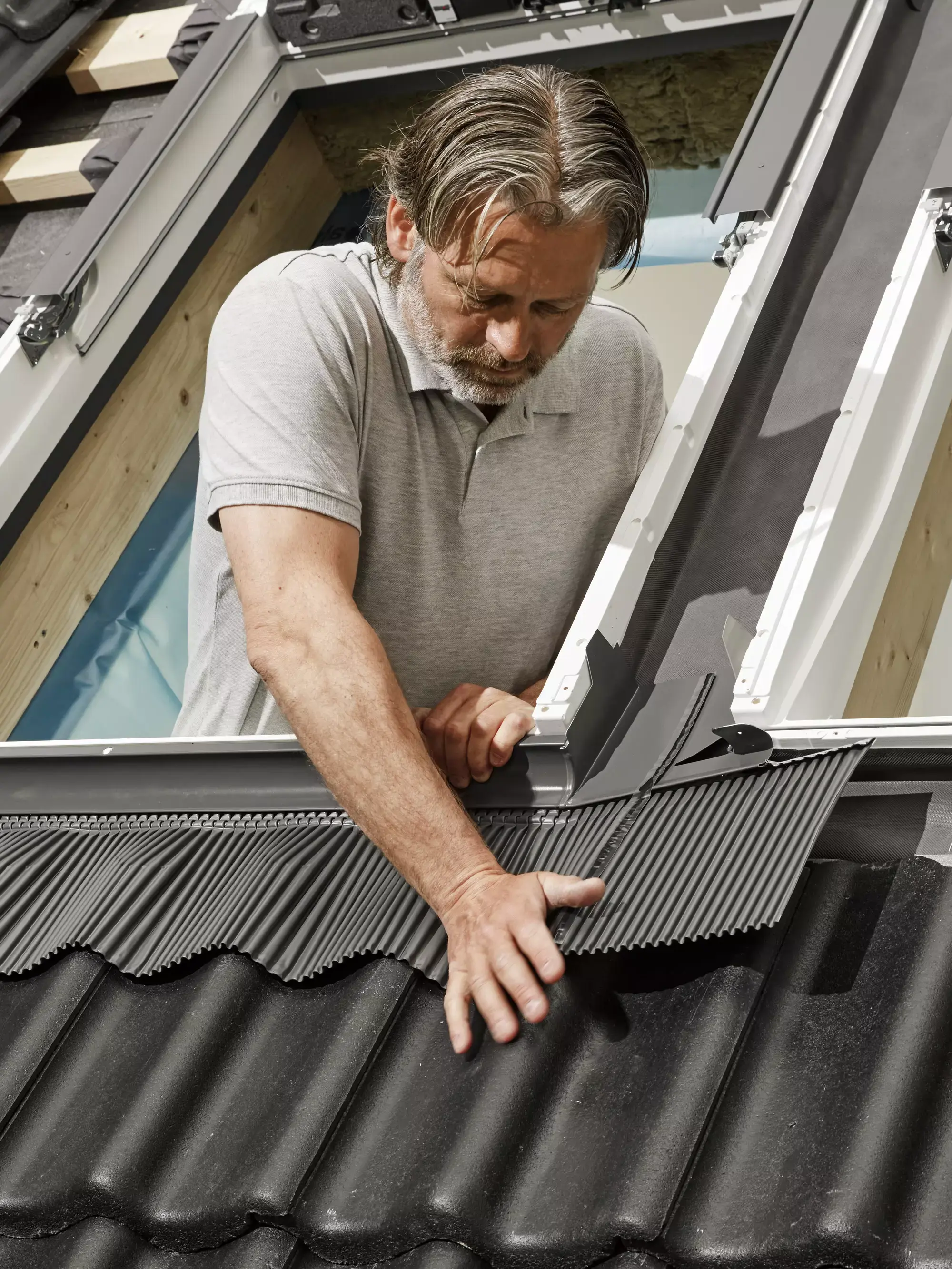 Installation of flashings, bottom section