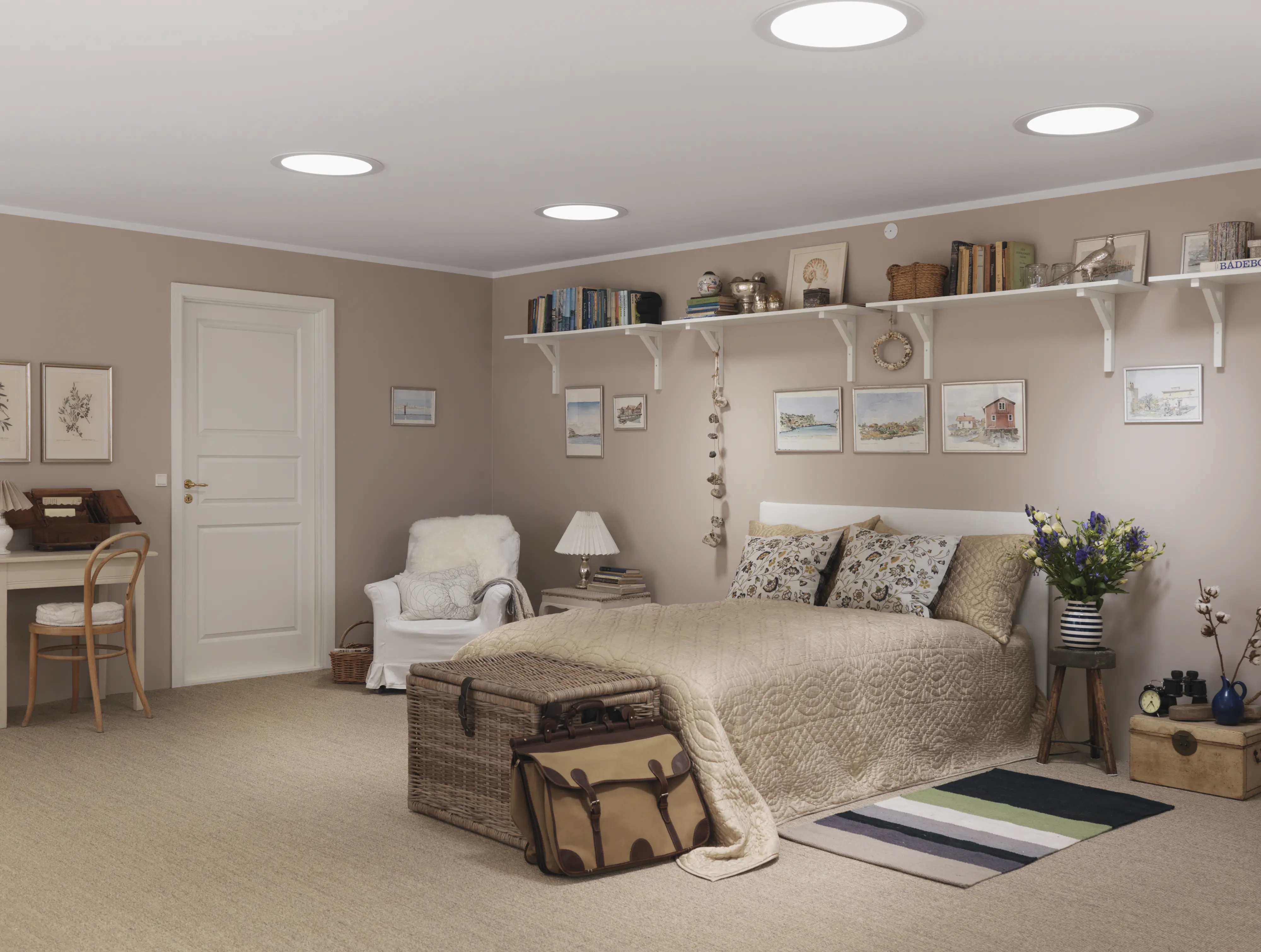 Guest room with bed, decor, and cozy atmosphere.