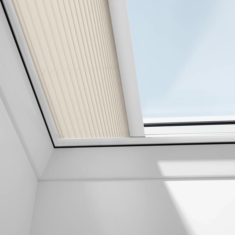 VELUX roof window in a room with flat ceiling, natural light entering.