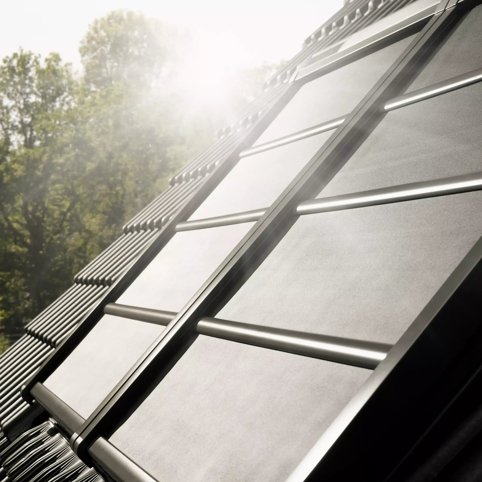 Solar roof tiles integrated with traditional roofing, harnessing solar energy.