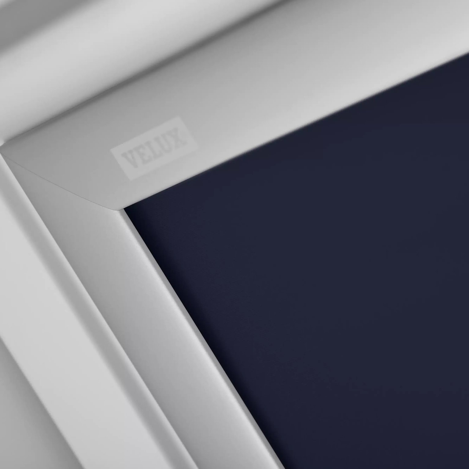Close-up of VELUX roof window, highlighting design and materials.