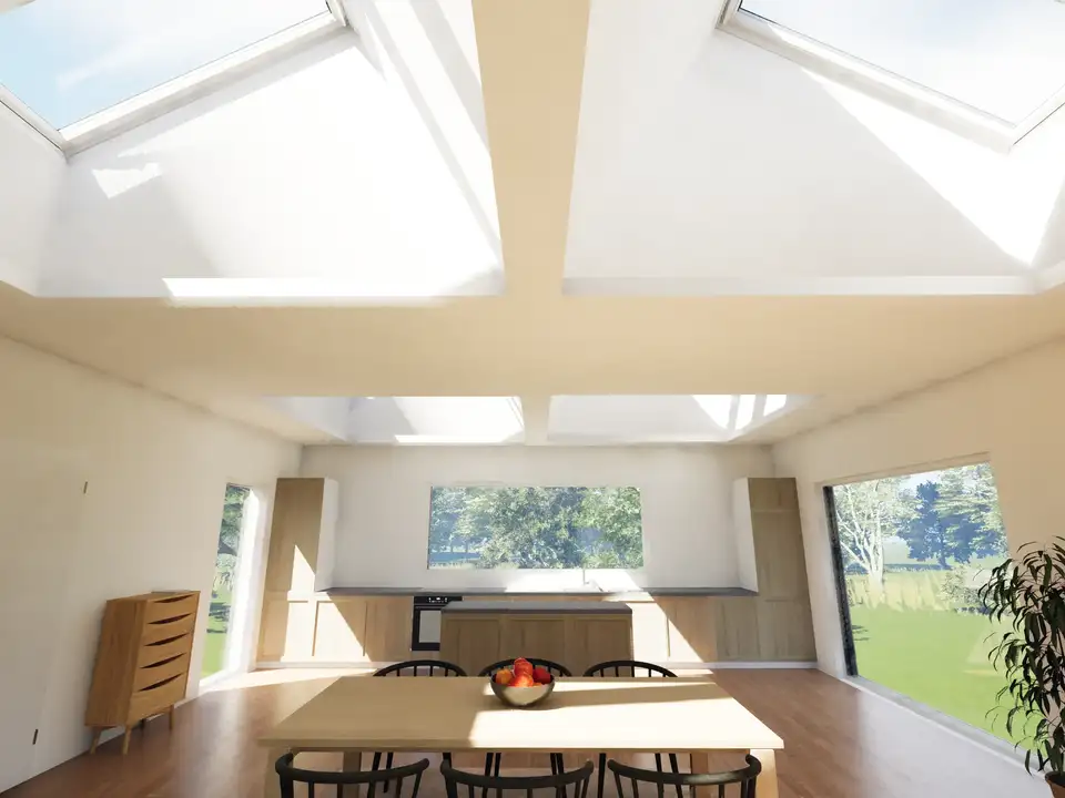 un salon ouvert profite d’une ventilation naturelle optimale grâce à ses nombreuses ouvertures sur l’extérieur - VELUX