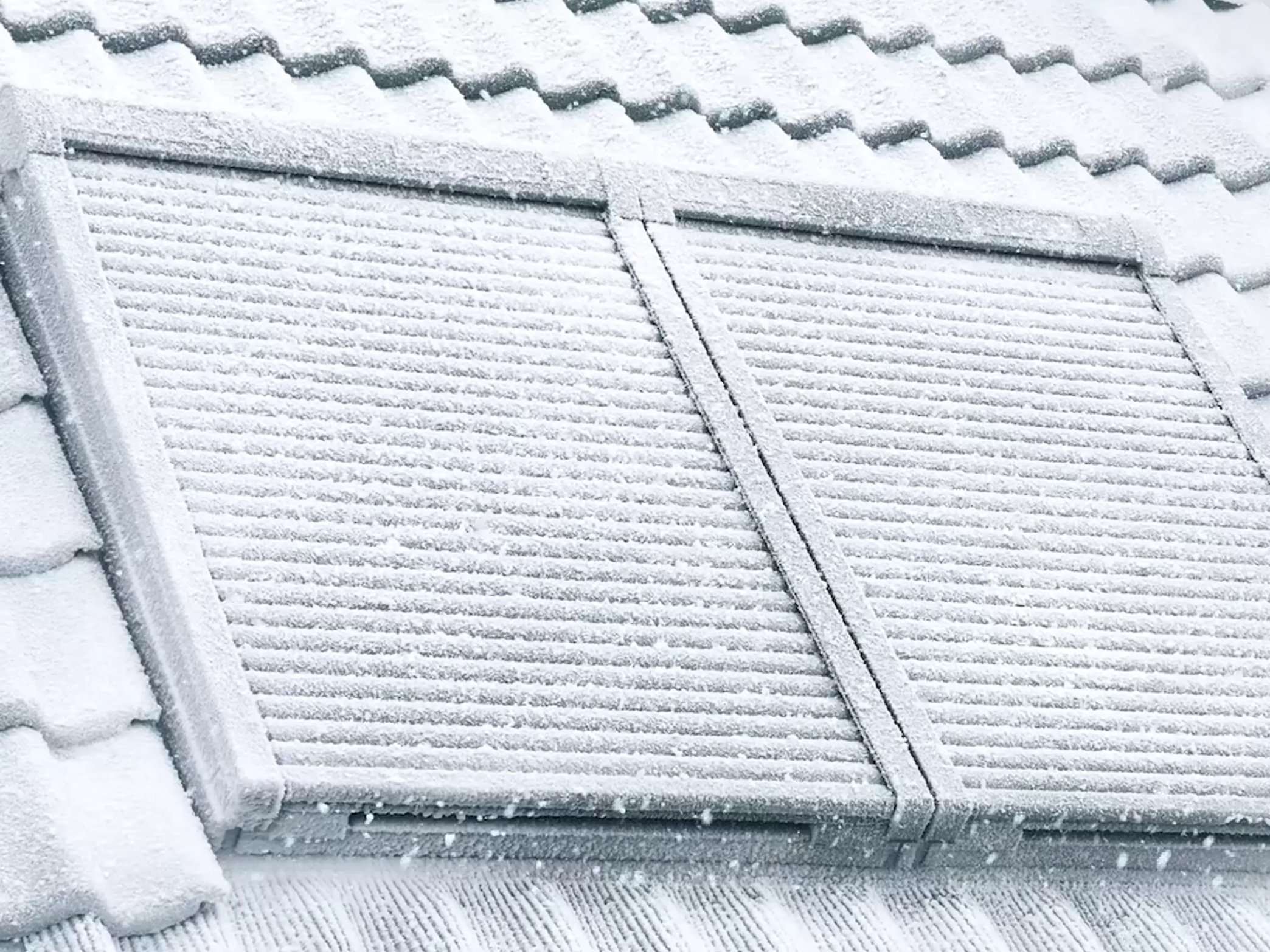 VELUX roof windows offer protection, cooling, and darkening benefits in various weather conditions.