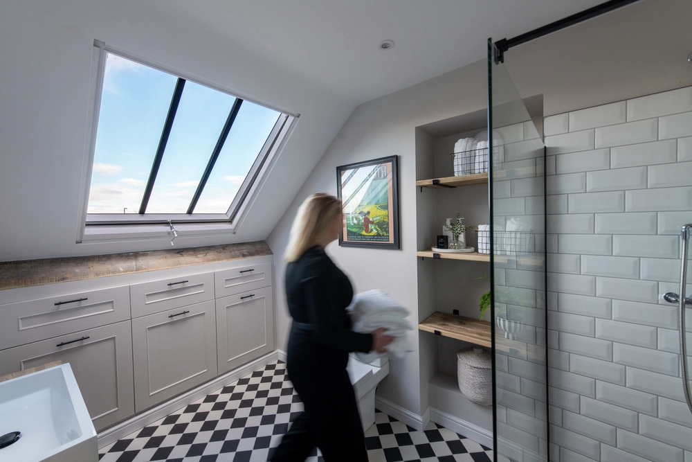 Bathroom with beautiful heritage roof window