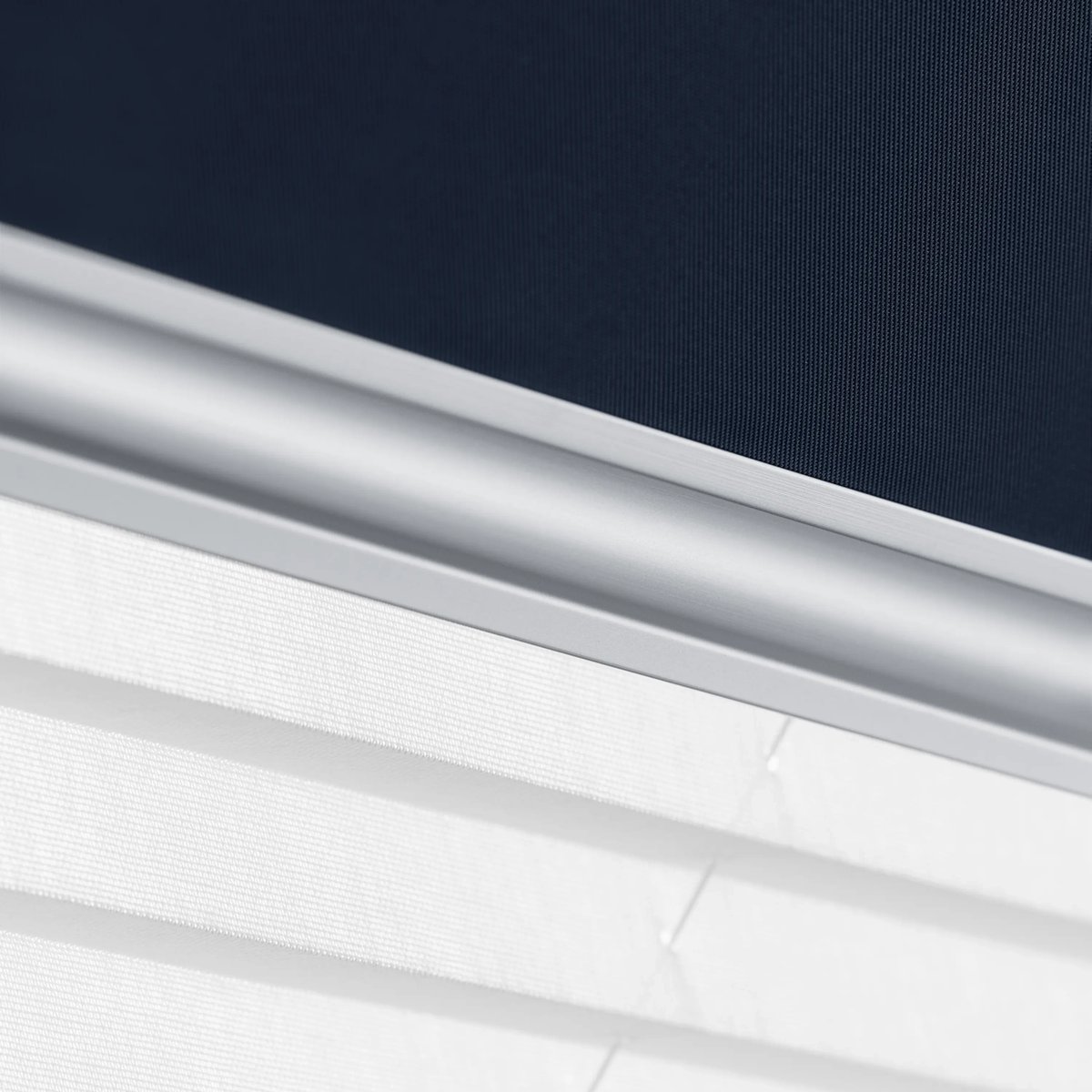 Close-up of modern window blind with sleek design and fabric texture.