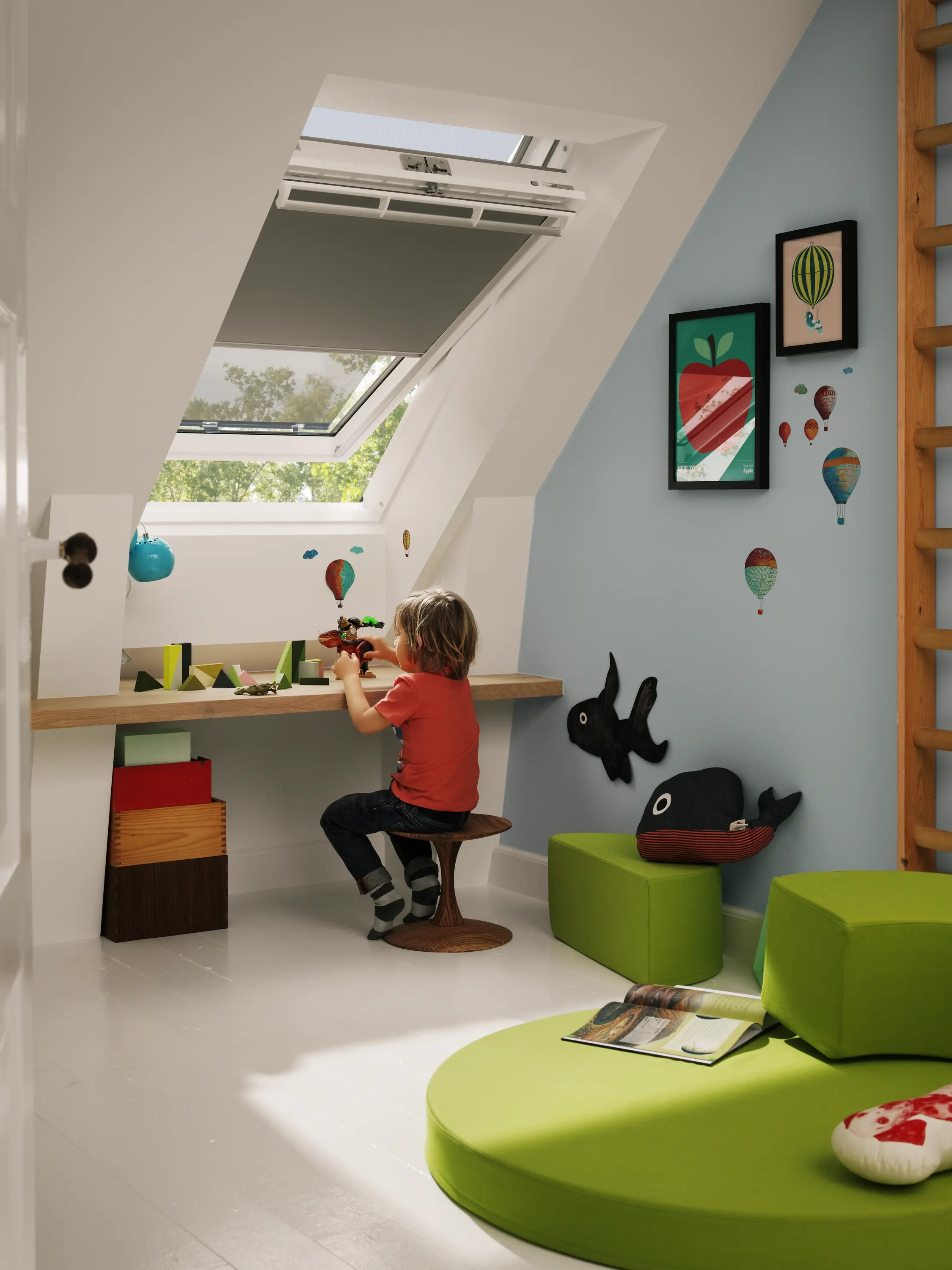 Attic kids room with sloped ceiling, VELUX roof window, child playing.