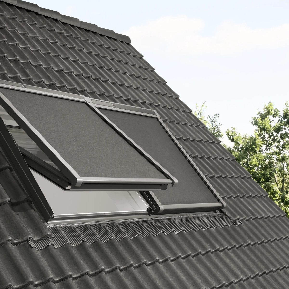Roof with dark tiles and a partially open VELUX window.