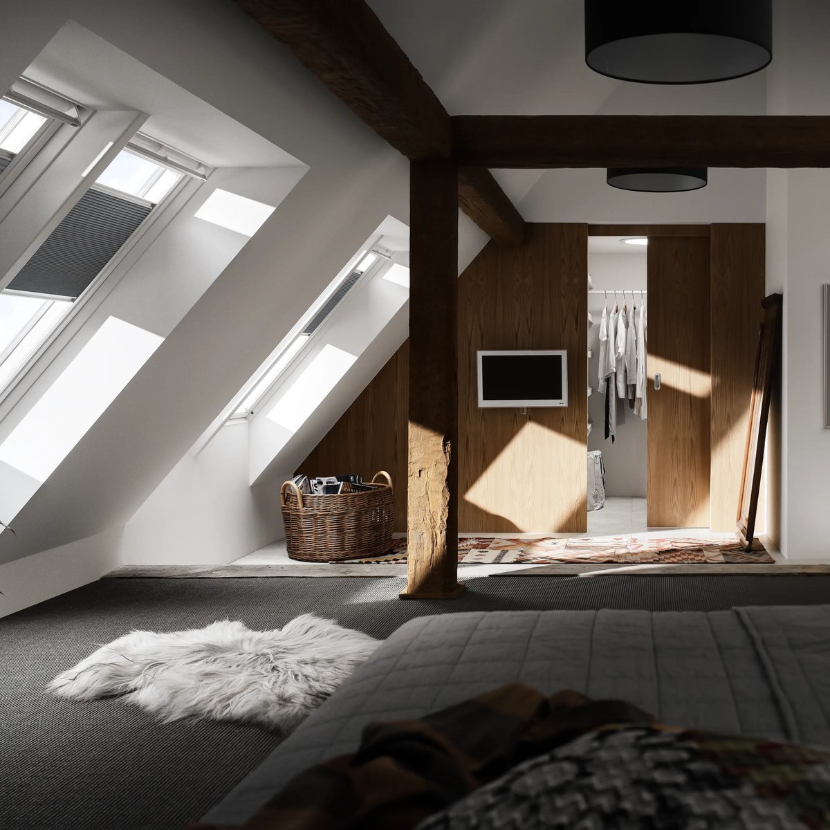 Attic bedroom with sloped ceiling, VELUX windows, and walk-in closet.