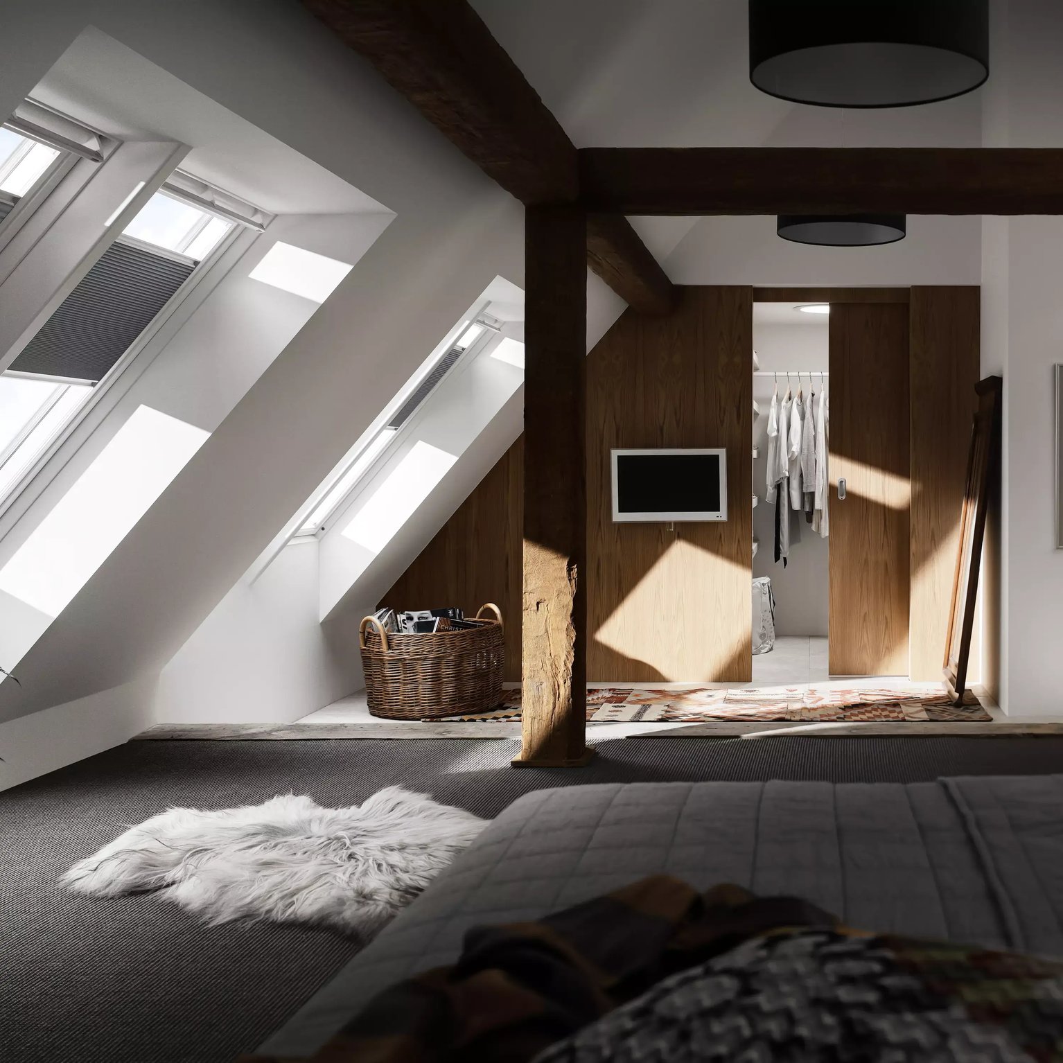 Attic bedroom with sloped ceiling, VELUX windows, and walk-in closet.