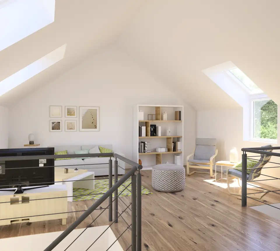 Soggiorno in mansarda arredato con mobili chiari e minimal e finestre per tetti VELUX che diffondono la luce in modo uniforme