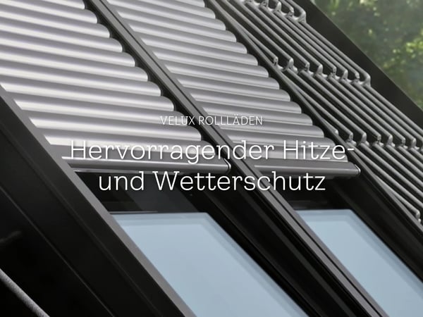 An attic kid's room with a VELUX roof window with a VELUX solar shutter rolling down