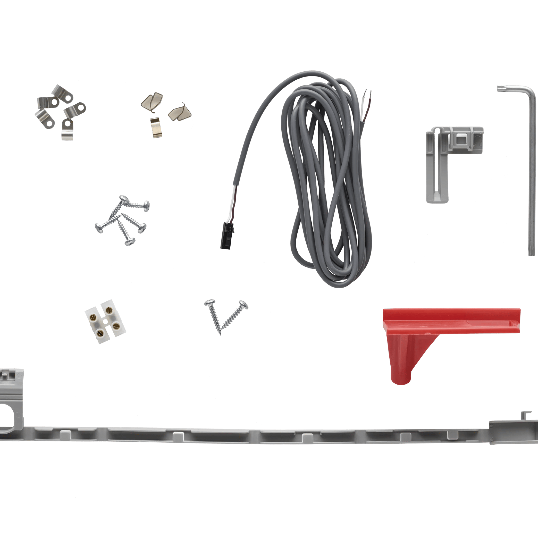 VELUX roof window installation kit with screws, brackets, and wiring.