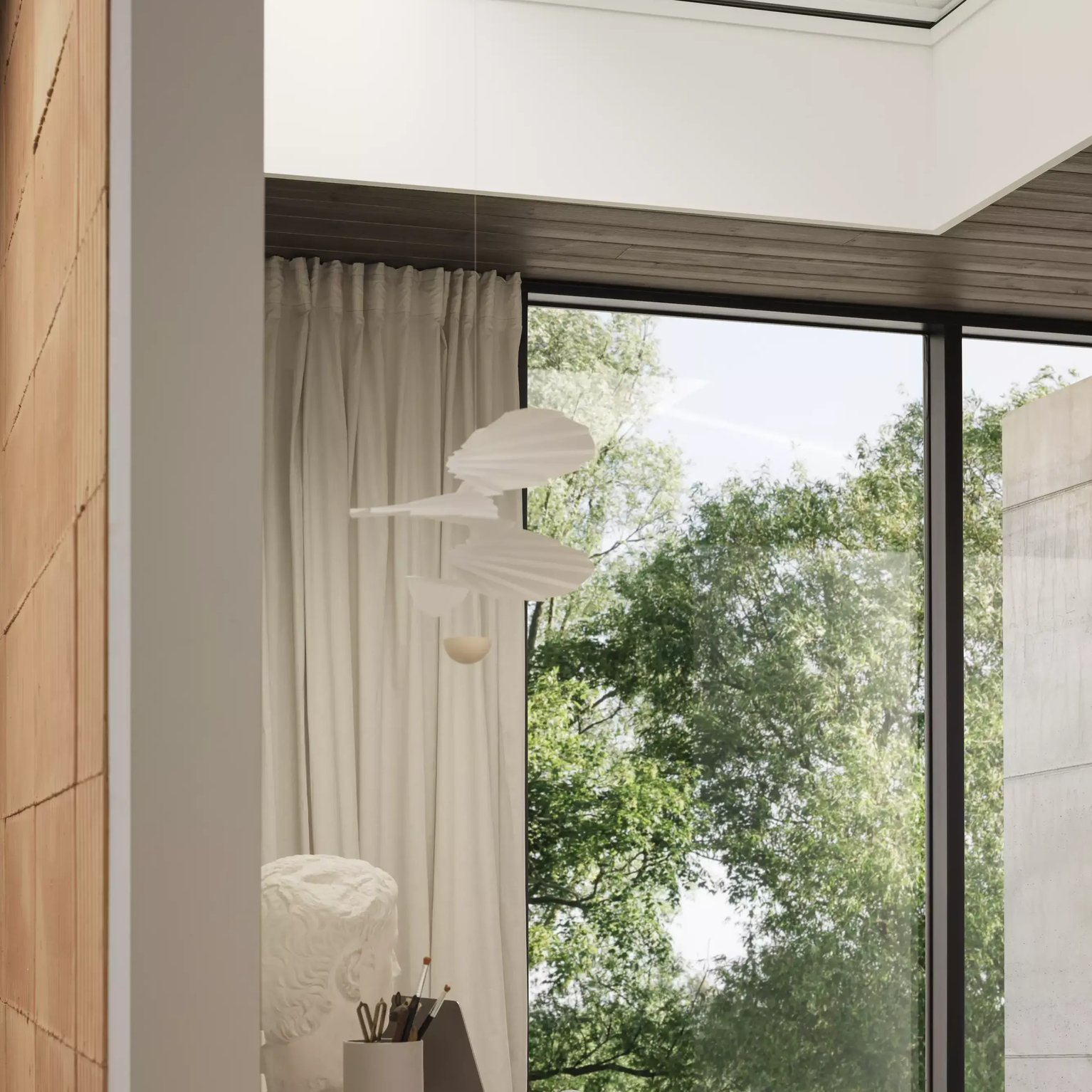 Home office with VELUX roof window, modern decor, and natural light.