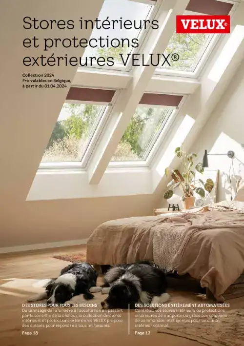 Gemütliches Schlafzimmer mit VELUX Dachflächenfenstern, sonnenbeschienem Bett, Pflanzen und schlafenden Hunden.