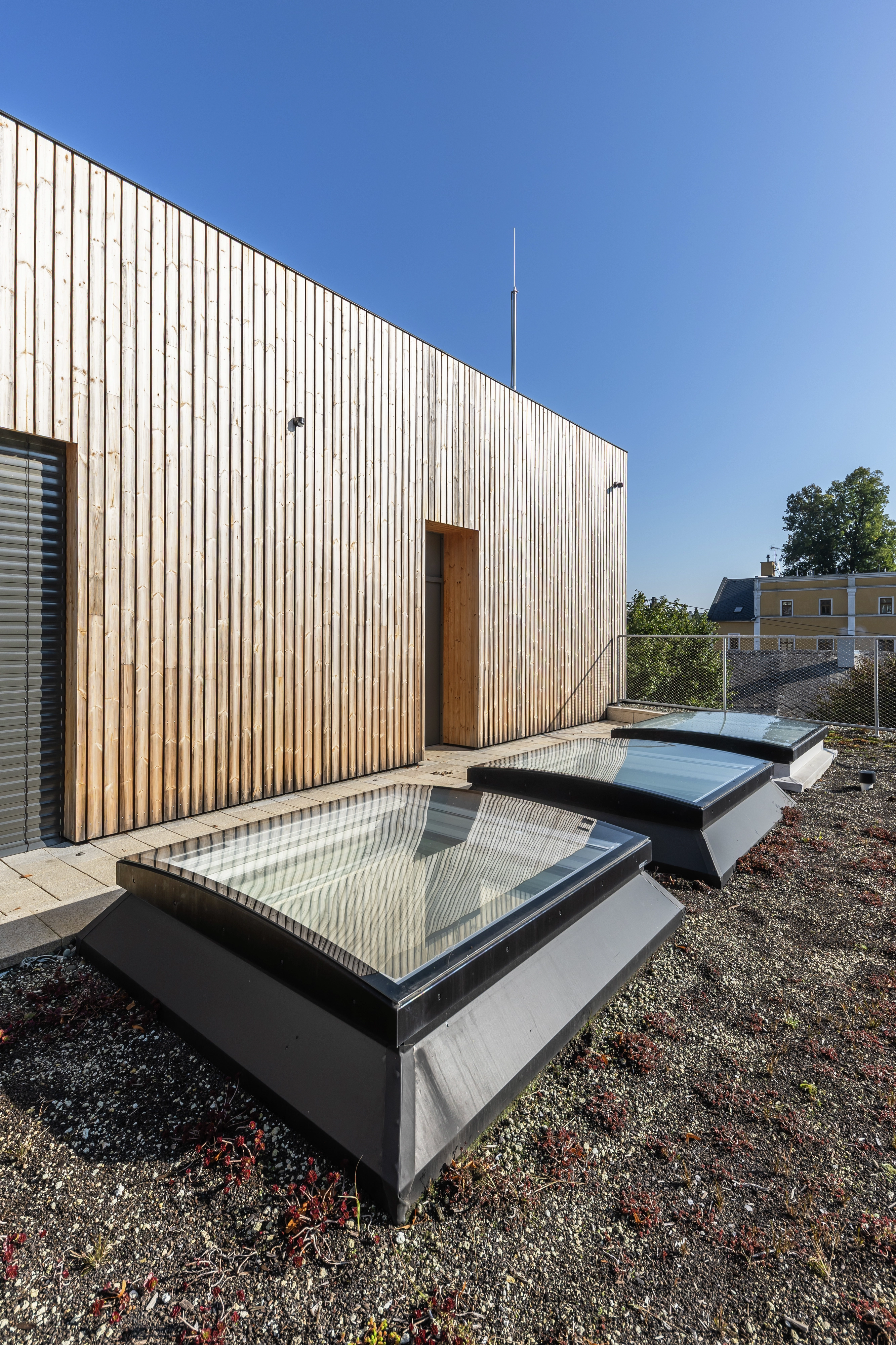 Modern building with flat roof and VELUX flat roof windows.