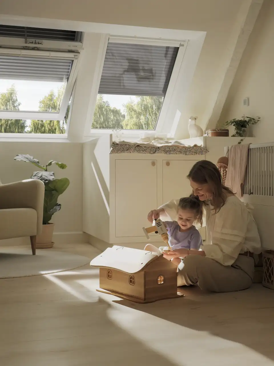 Attic kids room with sloped ceiling and VELUX roof 
