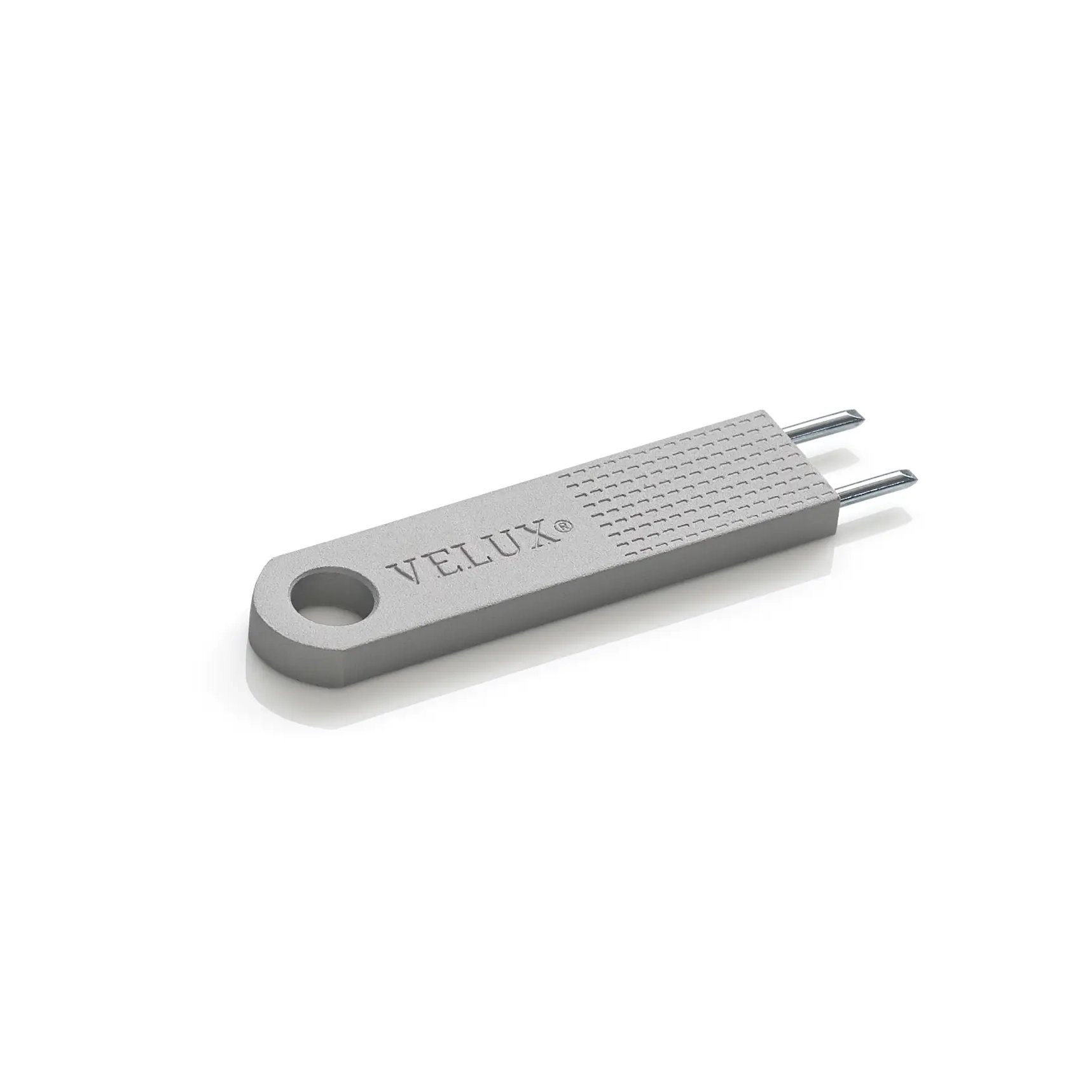 VELUX key tool for roof window operation, compact and efficient design.