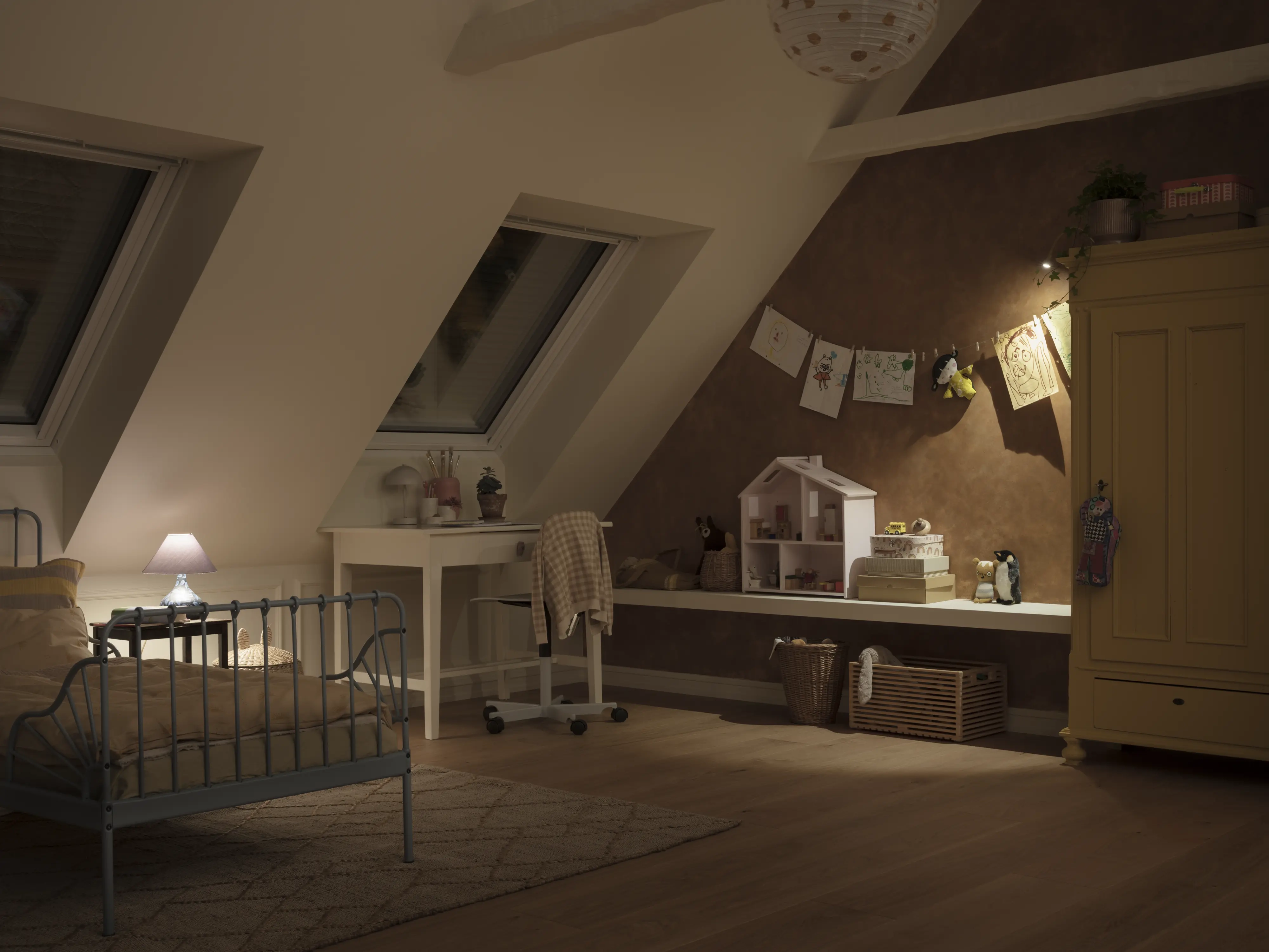 Attic kid's room with sloped ceiling and VELUX roof windows and shutters, playful decor.