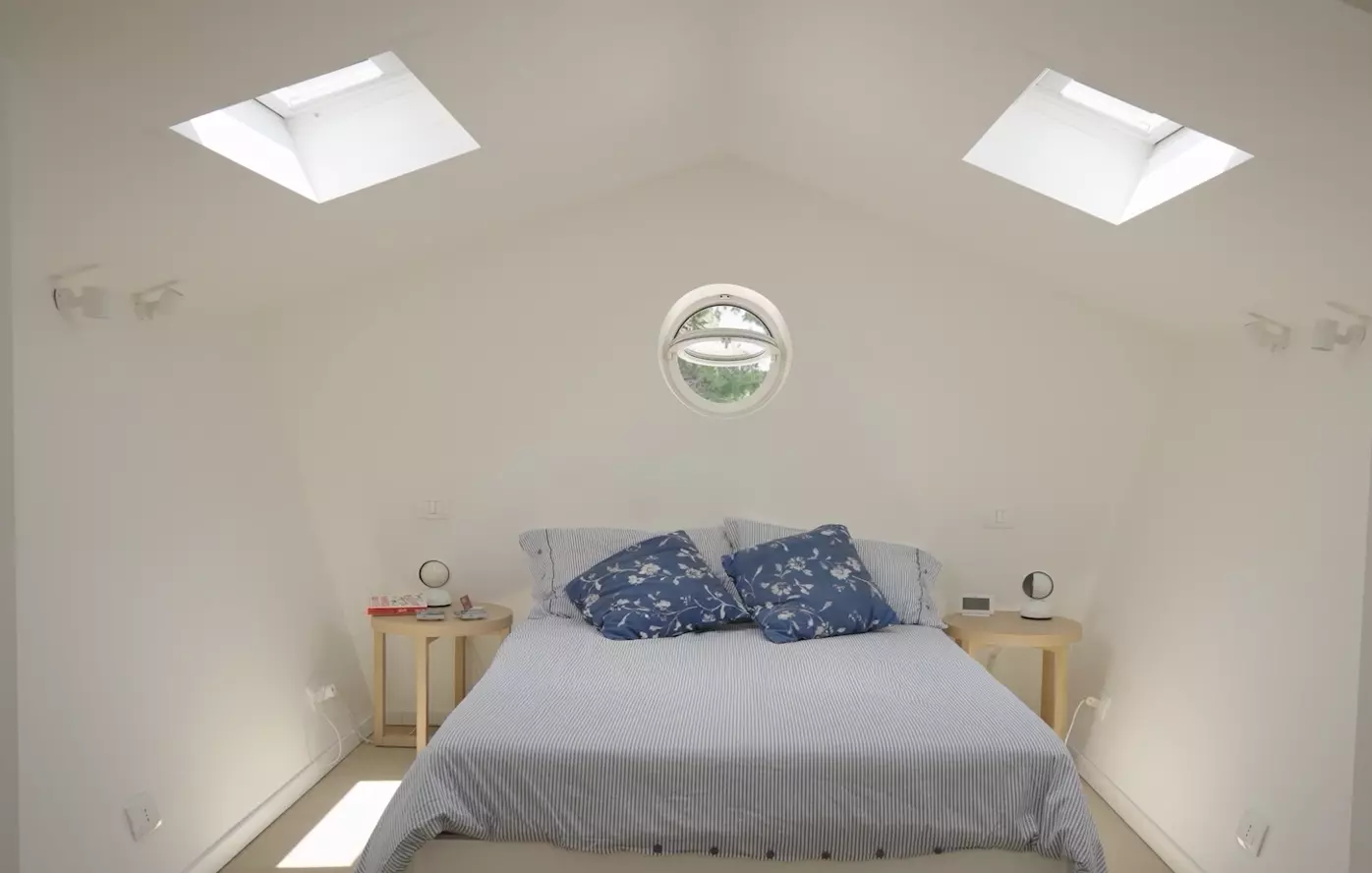 bedroom with two VELUX roof windows