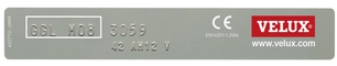 VELUX roof window label with model and certification details.