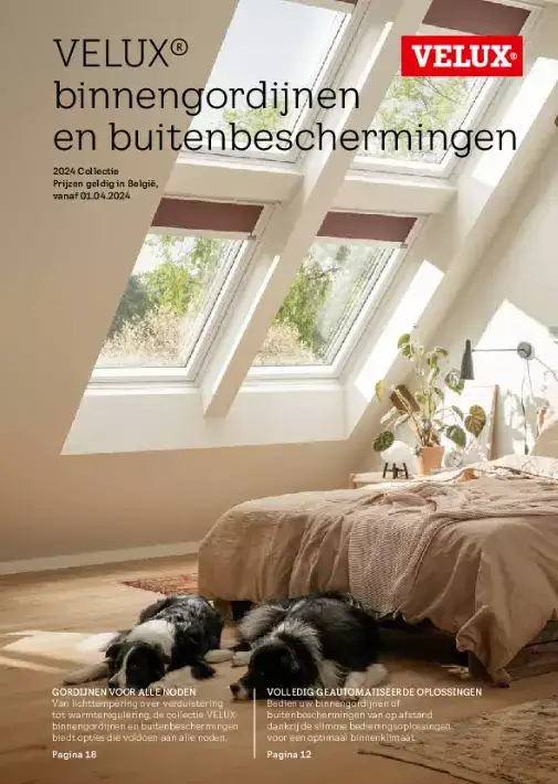 Helles Dachboden-Schlafzimmer mit VELUX Dachflächenfenstern, Pflanzen, Bett und zwei Hunden auf dem Boden.