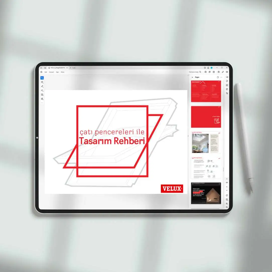 Tablet showing VELUX roof window design guide.