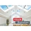Kitchen with VELUX roof windows and sloped ceiling.