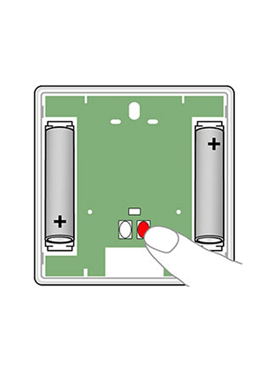 Battery compartment with two batteries and a finger pressing a red button.
